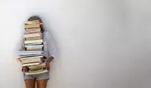 Student holding books