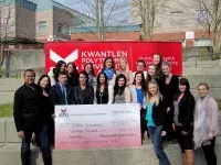 The Kwantlen Polytechnic University public relations students behind the Growth Gala show off the amount they raised for STAND Foundation at KPU Richmond.