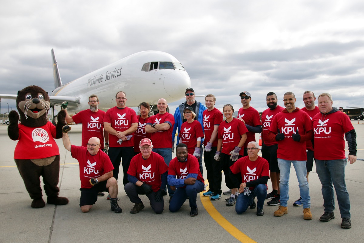 KPU team poses after pulling plane at UPS Plane Pull benefitting the United Way. 