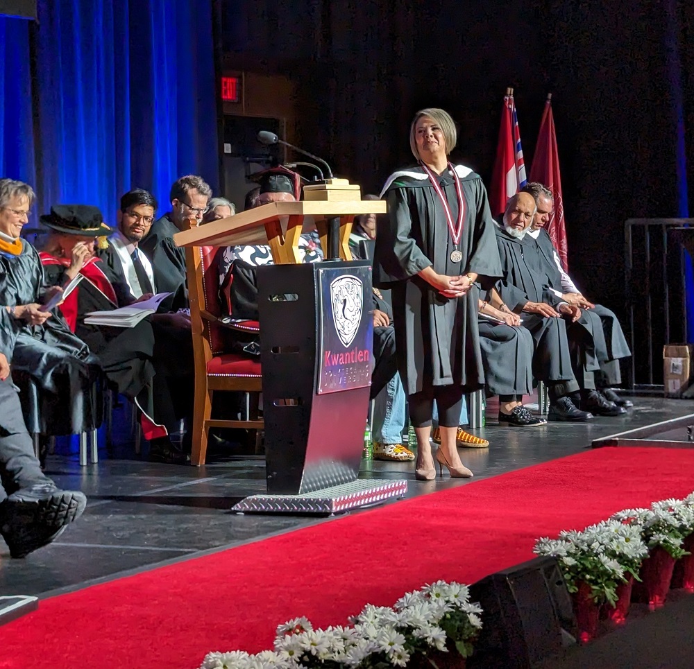 Paola Gavilanez on stage at KPU receiving her Distinguished Teaching Award.