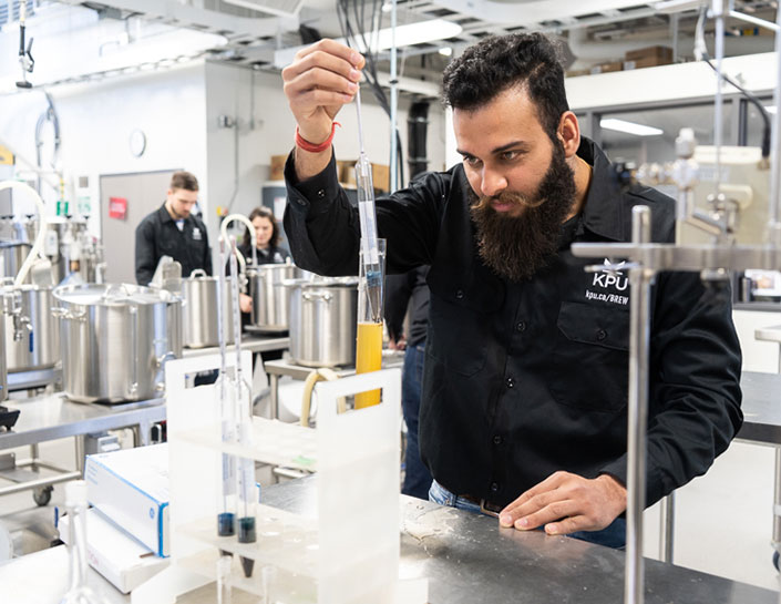 Student in brewing class