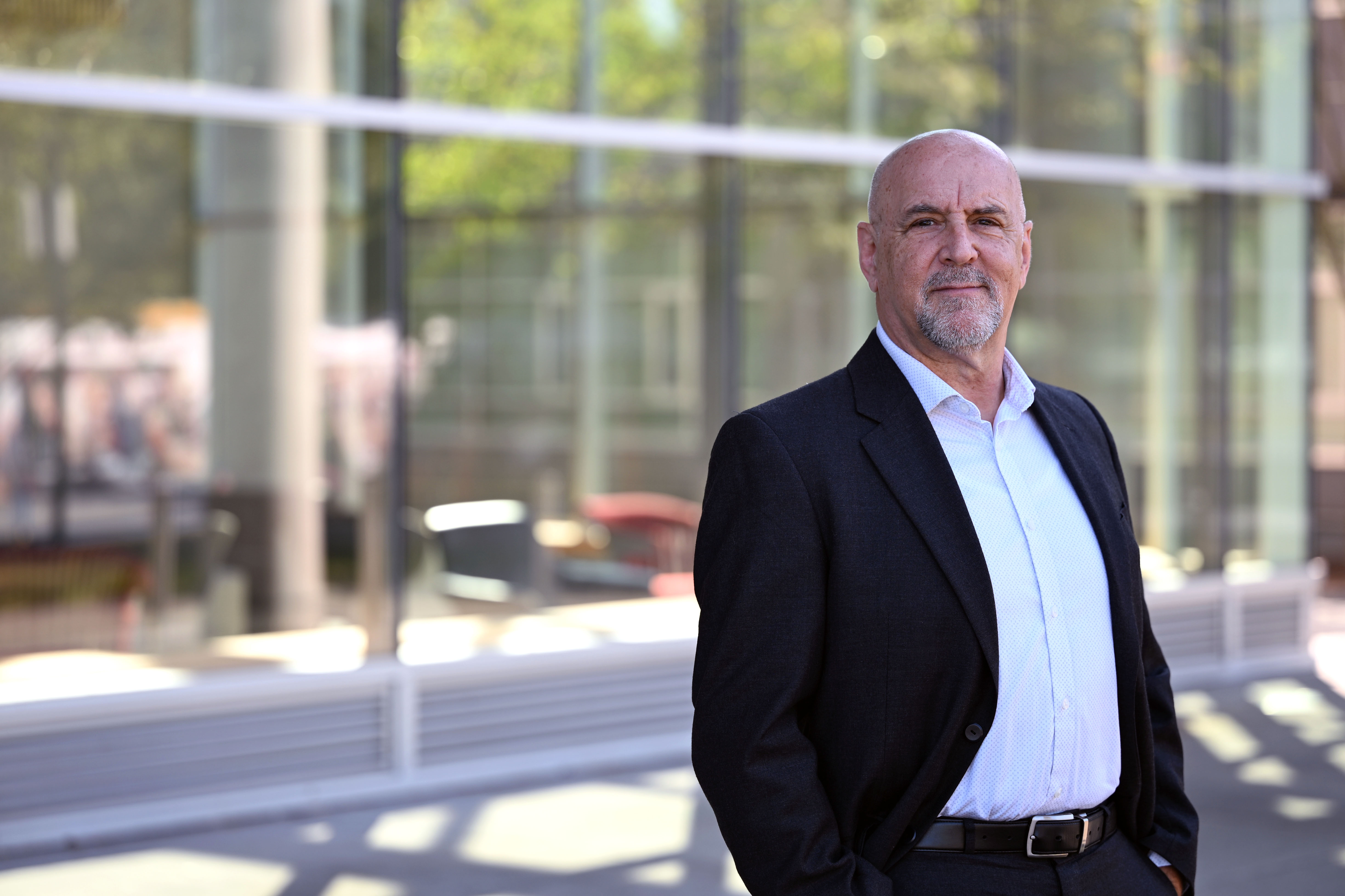 Bryan Webber standing outside KPU Surrey.