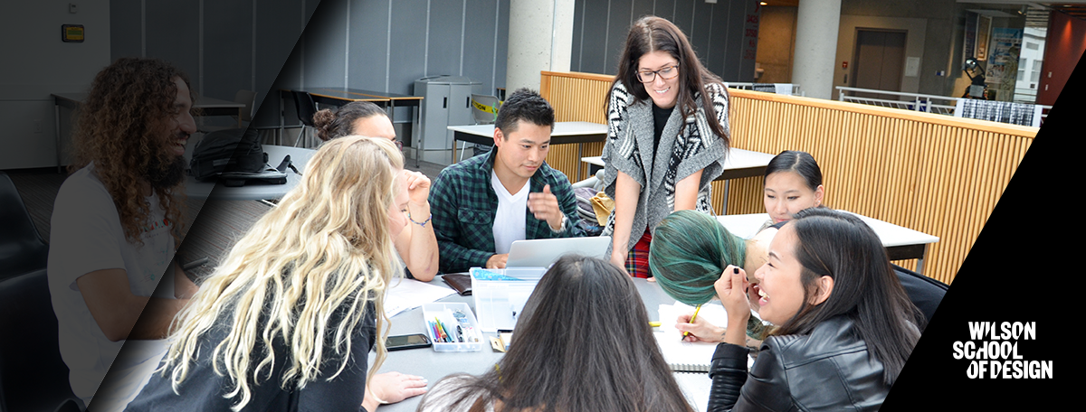 Students work together around a table.