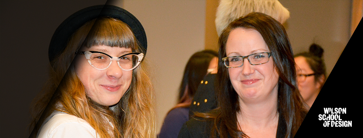 Two faculty smiling for a photo.