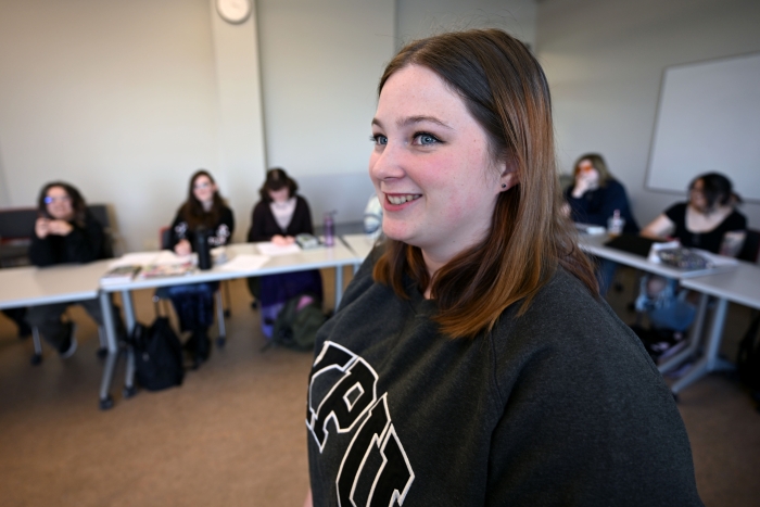 Isabelle Reader in front of a class