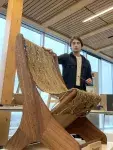 A product design student presents his mahogany chair.