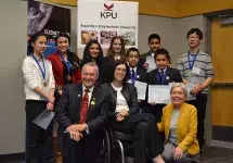 Minister of Education Peter Fassbender, Minister of Children and Family Development Stephanie Cadieux and Patti Leigh, executive director of Science Fair Foundation BC, with the winners of last week’s South Fraser Regional Science Fair, hosted at KPU Surr
