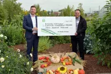 Tony Mauro of TD Bank Group, presents a $300,000 donation to KPU Farm on Sept. 13, received by Randall Heidt, Vice-President, External Affairs at KPU. 